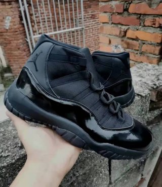 Air Jordan 11 all black shoes